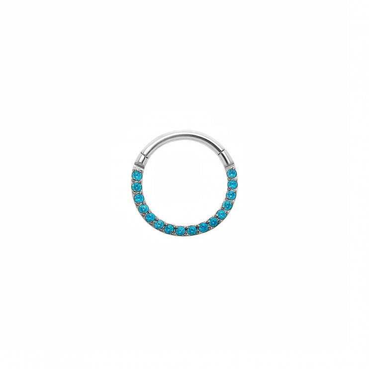 Кликер из титана с голубыми цирконами на фронтальной части  